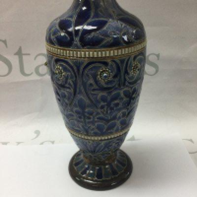 A Doulton Lambeth vase with floral decorations design by Emily Stormer 25 cm