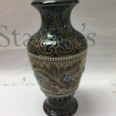 A Doulton Lambeth vase with floral decorations 22 cm