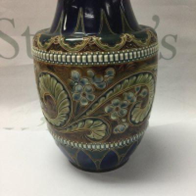 A Doulton Lambeth Art union of London vase by ELiza Simance . 20 cm Decorated with floral design.