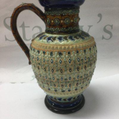 A Doulton Lambeth jug designed by Emily Partington