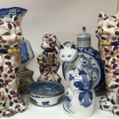 A collection of ceramics a large Masons blue and white jug 20th Century Chinese cat and monkey figures and other ceramics.