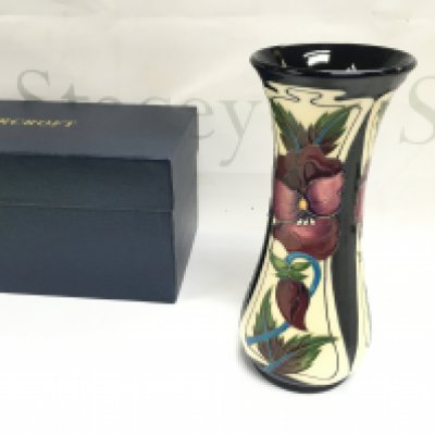 A boxed moorcroft limited edition vase. 21cm tall.