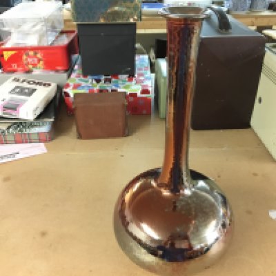 Sutton Taylor earthenware lustre ware red bottle vase with tall narrow neck. 40cm tall. Impressed ST mark. Good condition