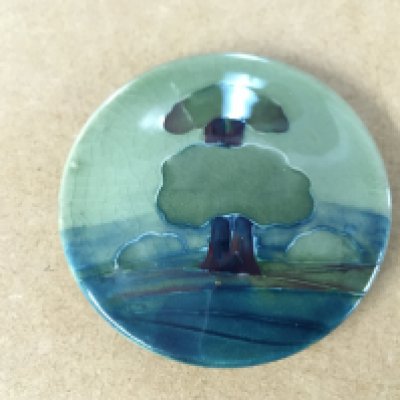 A Moorcroft Hazledene pot lid 3" diameter.