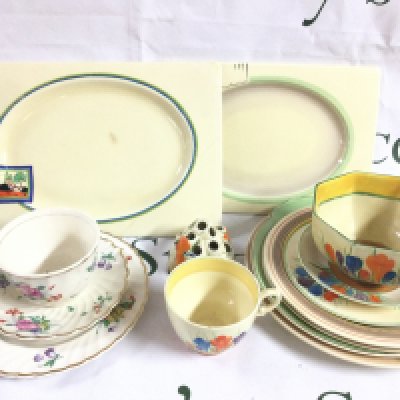 A collection of Clarice Cliff ceramics including dishes, plates, cups etc. The Biarritz Royal Staffordshire, Crocus bowl, . Some damage.