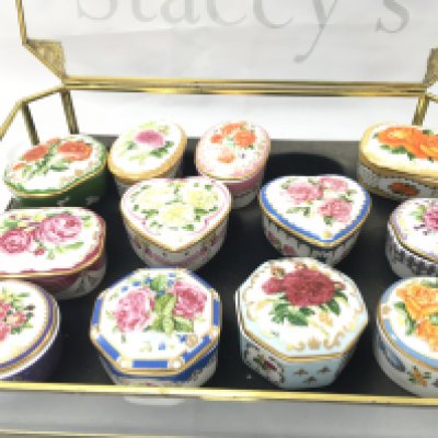 A Collection of Ceramic Musical Boxes.