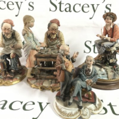 Four Capodimonte figures including fishing boy, Gentlemen gossiping, Cobbler etc. this lot cannot be posted