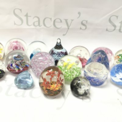 A Collection Of Glass Paper Weights.