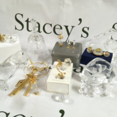 A collection of Swarovski crystal glass , Waterford and other glass ornaments . This lot cannot be posted