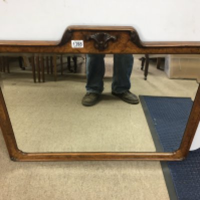 A walnut framed wall mirror. Approx 83 x60cm NO RESERVE