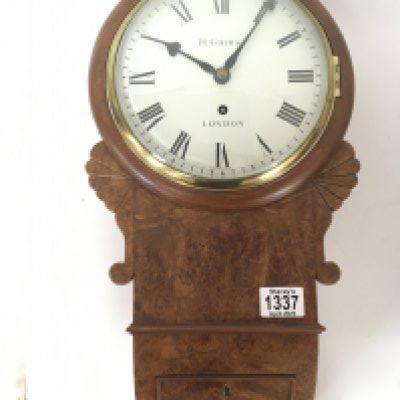 A Quality late 19th century burr walnut cased wall clock with a single fusee movement brass pendulum the dial with makers inscription H Gibbs London. Dial diameter 25cm