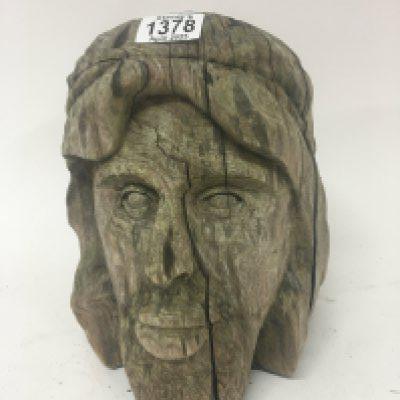An Antique carved wood live size bust of Jesus. Height 27cm.