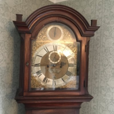 A George III mahogany long case clock the dial with a silvered chapter ring eight day going movement maker William Allan London.