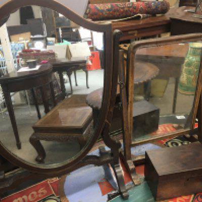 A Sheild shaped George III dressing mirror a small rosewood box and one other table top dressing mirror