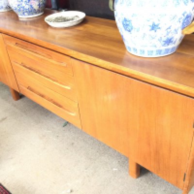 A Danish Mid 20th Century Design Sideboard. Approx length 198CM. Height 74CM.