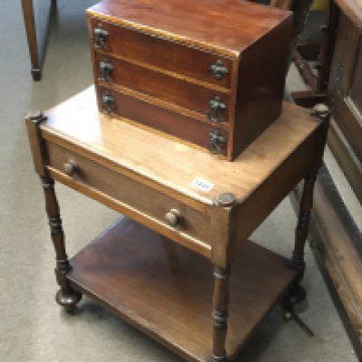 A small collectors cabinet with a flight of three drawers and a Victorian table with single drawer on turned supports (2)