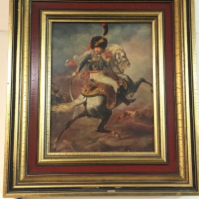 A framed oil on board painting titled The Charging Chasseur.