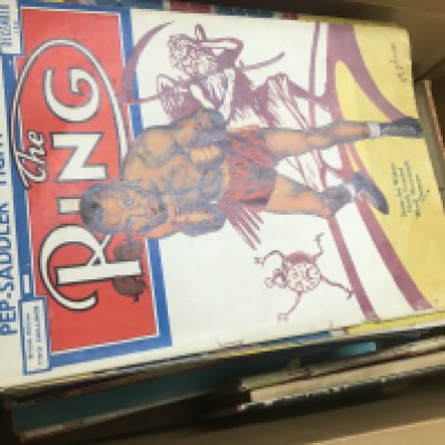 A collection of vintage mid 20th century The Ring boxing magazines . Postage cat b. NO RESERVE