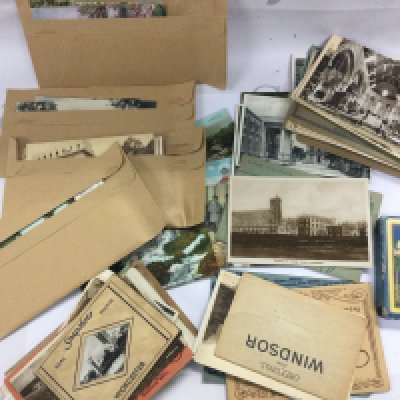 A collection of vintage UK postcards, some world and a pack of Panama souvenir playing cards made in USA . Postage category A