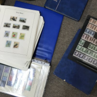 A box containing GB and world stamps.