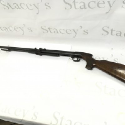 A vintage Lincoln air rifle with slip. 110cm overall length.