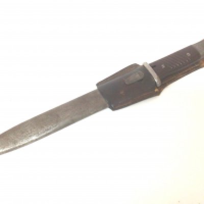 A German K98 Mauser II world war Bayonet maker WKC with original leather frog attachment.