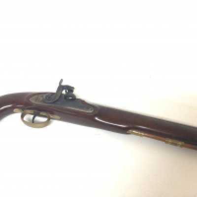 A Modern Precession Black Powder Pistol maker P Bondini Italy with a full length mahogany stock octagonal barrel brass fittings cal 45 serial number C245521 PLEASE NOTE A FIREARM LICENSE IS REQUIRED TO BUY THIS LOT BLACK POWDER. COLLECTION BY APPOINTMENT ONLY- NO RESERVE