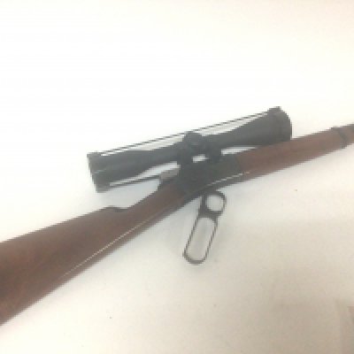 A Nice 22 Browning Rifle under leaver action three quarter walnut stock with an attached scope. The gun in very good condition an ideal entry level target rifle or ideal Rabbit and small game gun serial number 69B14698. Total length 92cm A FIRE ARMS LICENSE IS REQUIRED TO BID AND BUY THIS LOT.VIEWING AND COLLECTION BY APPOINTMENT ONLY.