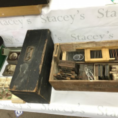 A magic lantern projector and a large number of assorted slides.