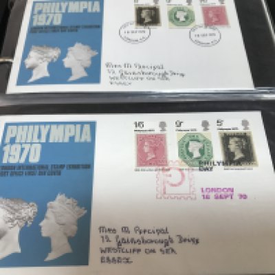 A box containing first day Covers various