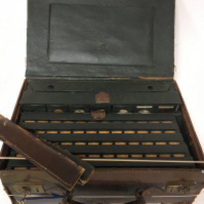 An unusual Specimen Spice case the leather case with a well fitted interior containing numerous spice samples case in need of restoration.