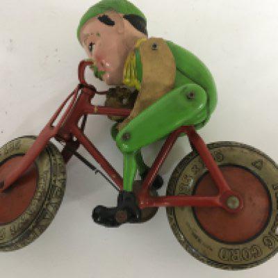 A Vintage Tri-Ang Cord Tin plate and Celluloid cycle