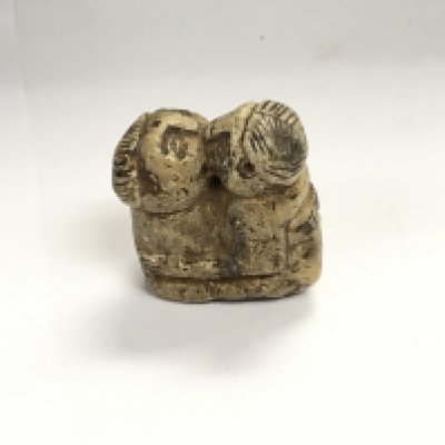 A hand carved stone amulet. NO RESERVE