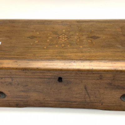 A small inlaid Victorian music box, in working condition, case in need of some restoration. 39cm x 13cm x 17cm. (D)