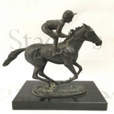 A modern bronze titled Champion Finish by David Cornell dated 1985. 20cm tall. Postage category B