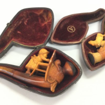 Two cased meerschaum Carved pipes. Postage category A