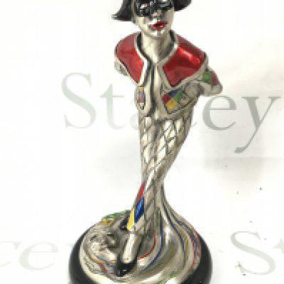 A sterling silver overlaid figure of a traditional Italian Arlecchino. Signed Midas. 25cm tall Postage category B