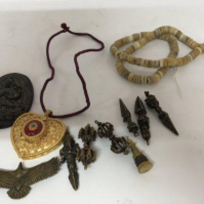 A collection of Buddhistic and Tibetan items.