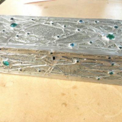 An art nouveau hand chased jewelled pewter box signed by unidentified artist france c1900 33cm wide 11 deep and 11cm tall.