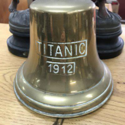 A brass Titanic bell .