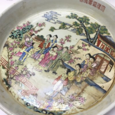 A Chinese Famille Rose Courtyard scene large dish , 41cm wide. No obvious large damage or restoration, some flaws in the glaze. This lot cannot be posted