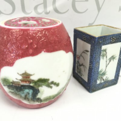 A Chinese Famille Rose brush pot with painted floral design panels ,surrounded by a light blue chicken skin ground and a red ginger jar decorated with hand painted landscape scenes . This lot cannot be posted