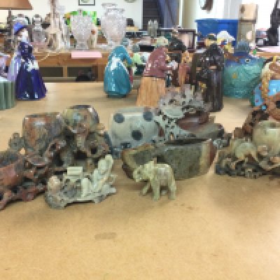 A collection of soapstone figures and ornaments , this lot cannot be posted