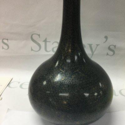 A Chinese cloisonn̩ vases the lack ground with floral design. 39 cm .