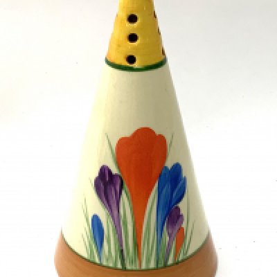 A Clarice Cliff Bonjour sugar sifter decorated in the 'Spring Crocus' pattern, painted.