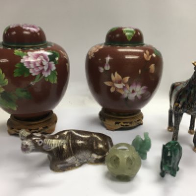 A collection of cloisonn&eacute; figures and vases with stands and some jade figures.