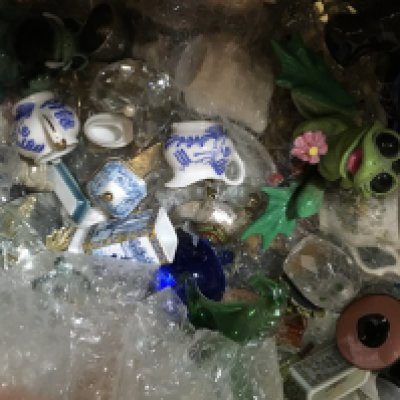 A box containing glass and porcelain ornaments various.