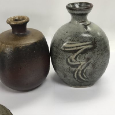 A collection of Art pottery including David Leach small jar and cover 11 cm a pair of danish vases , two vases and two egg cups .