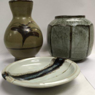 Two David Leach stone ware vases 22 cm 18 cm and a shallow grey glazzed dish