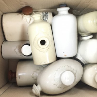 A collection of stoneware bed warmers. Postage D